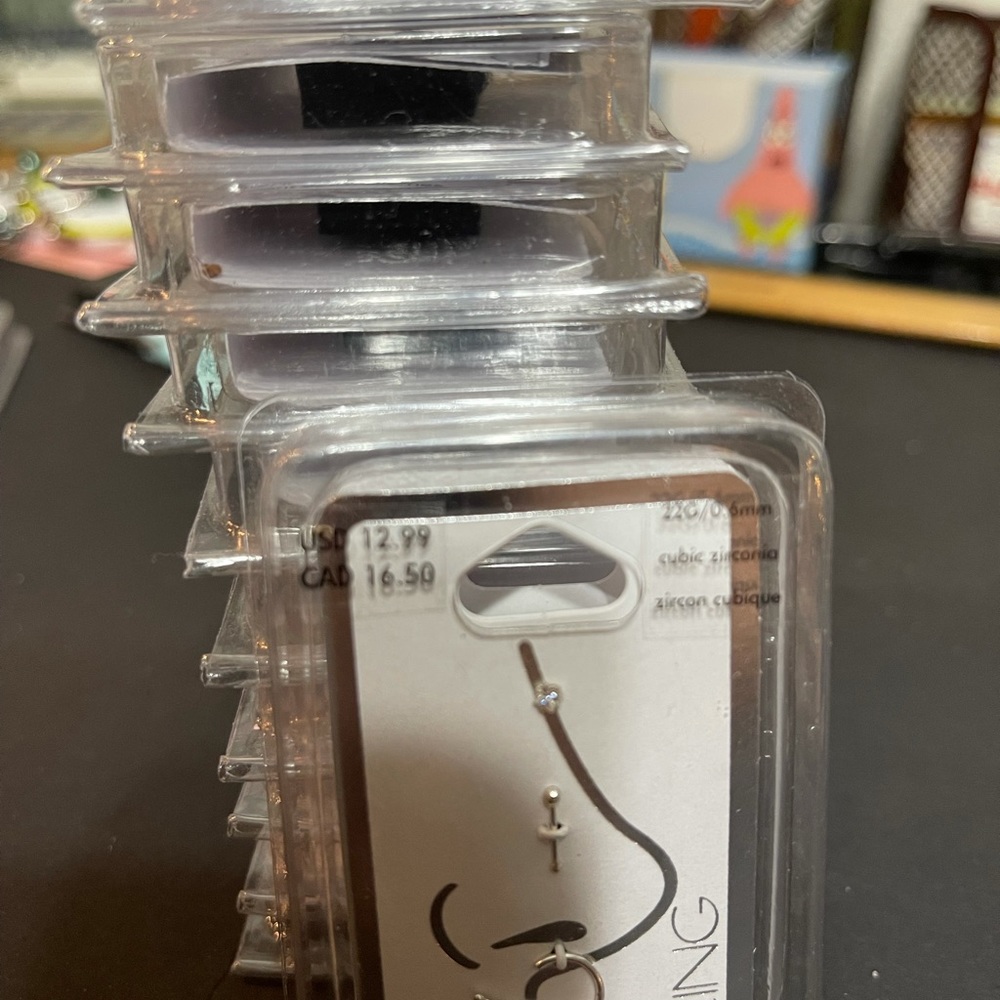 Claims Sterling Silver nose rings half price. Each item separately.